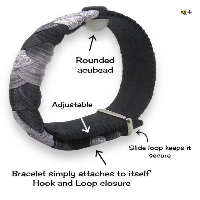 Wristband with VELCRO® brand closure symbolizing adjustable anxiety and nausea relief.