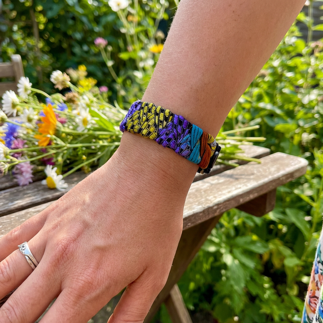 Adjustable AcuBracelet acupressure bracelet for anxiety and mood balance support, featuring colorful beads and a comfortable fit.